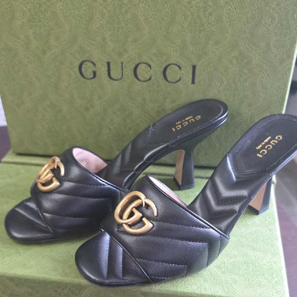 Gucci Black and Gold Leather Mules